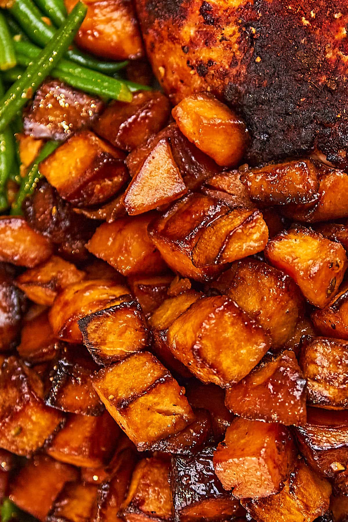 Honey Roasted Sweet Potatoes served with salmon and green beans.