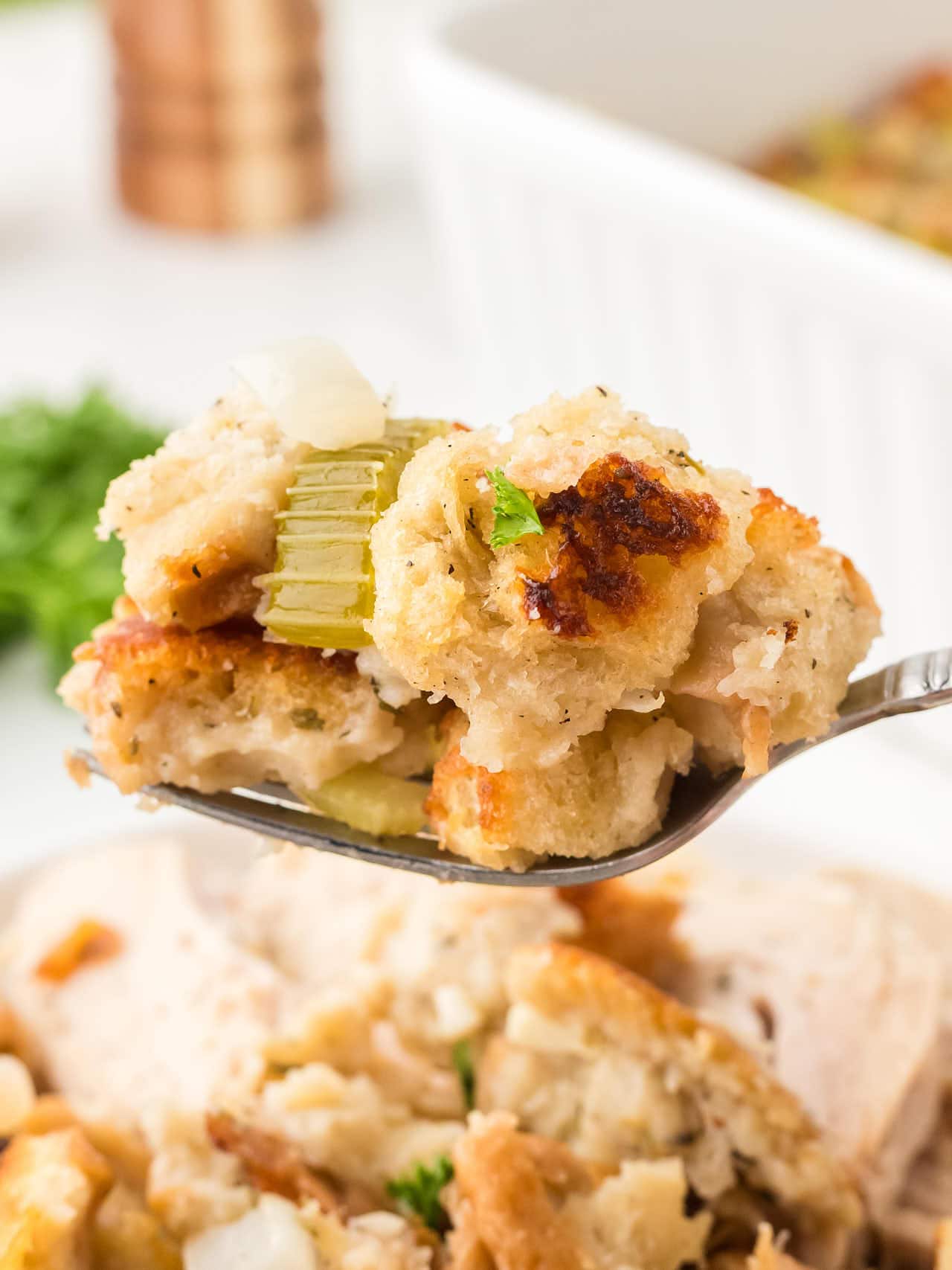A spoonful of homemade Stuffing.
