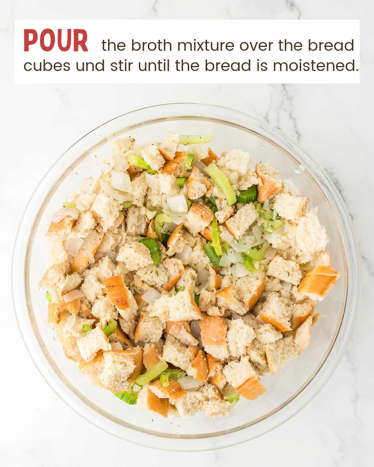 Pour stuffing liquids over the bread cubes. 
