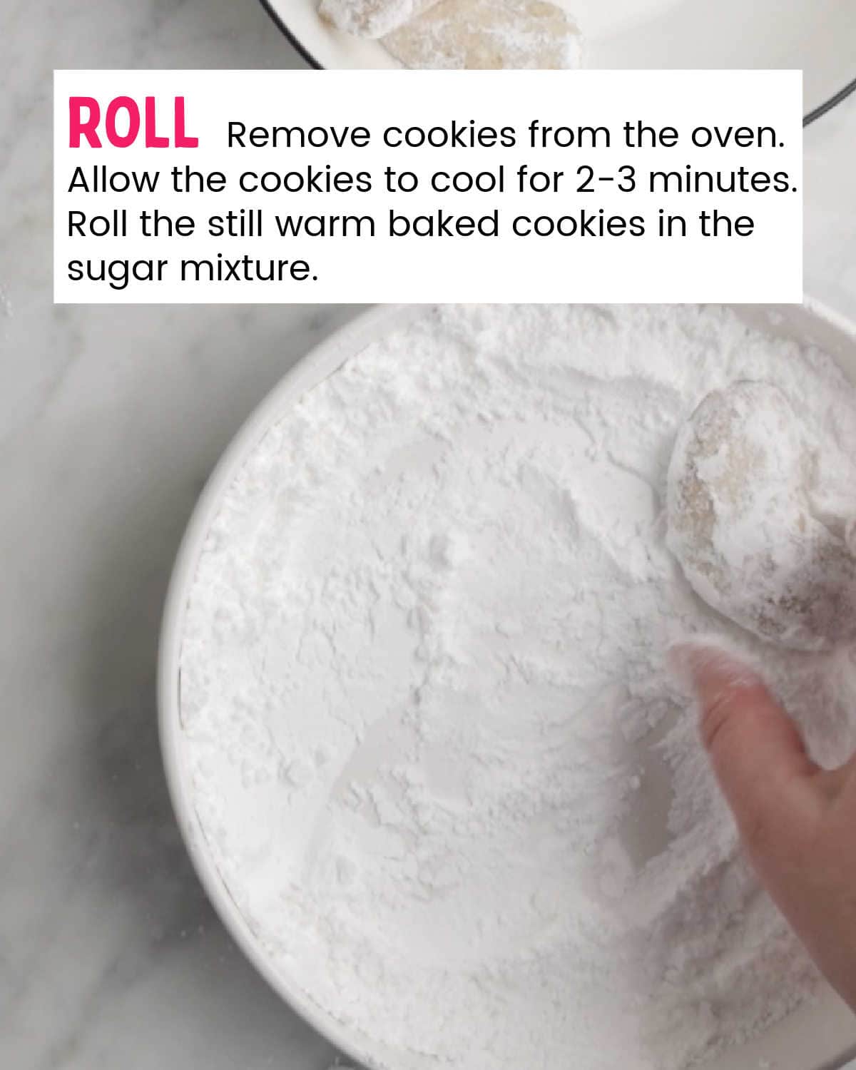Process Step: Roll baked warm cookies in sugar. 