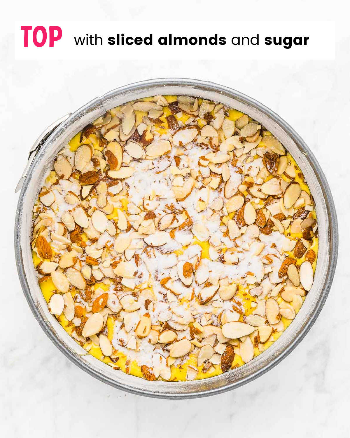 Step: Sprinkle with sliced almonds and sugar. 