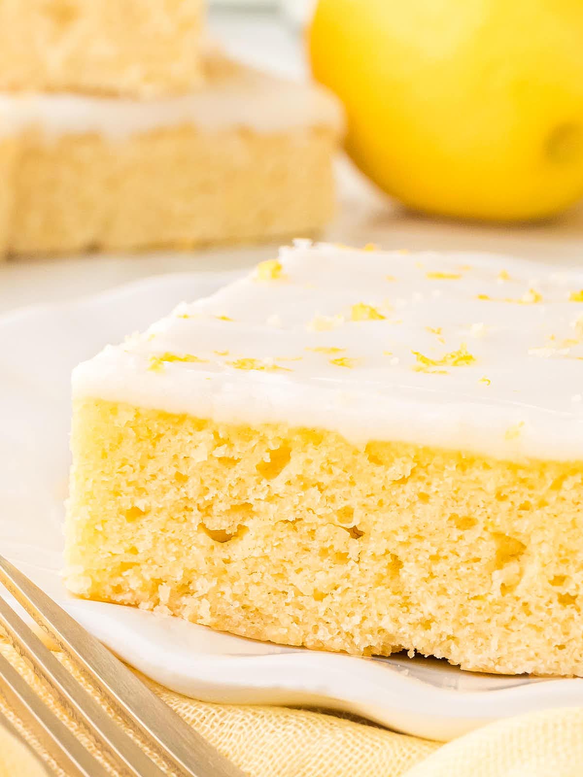 Closeup of a slice of German Lemon Sheet Cake.