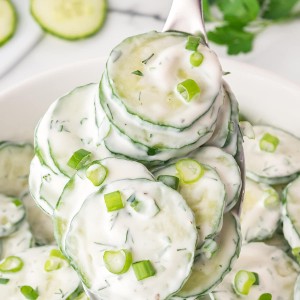 A forkful of Creamy German Cucumber Salad.