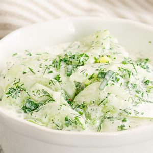A bowl of creamy cucumber salad