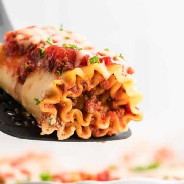 a slice of freshly baked lasagna roll ups