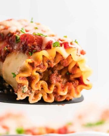 a slice of freshly baked lasagna roll ups