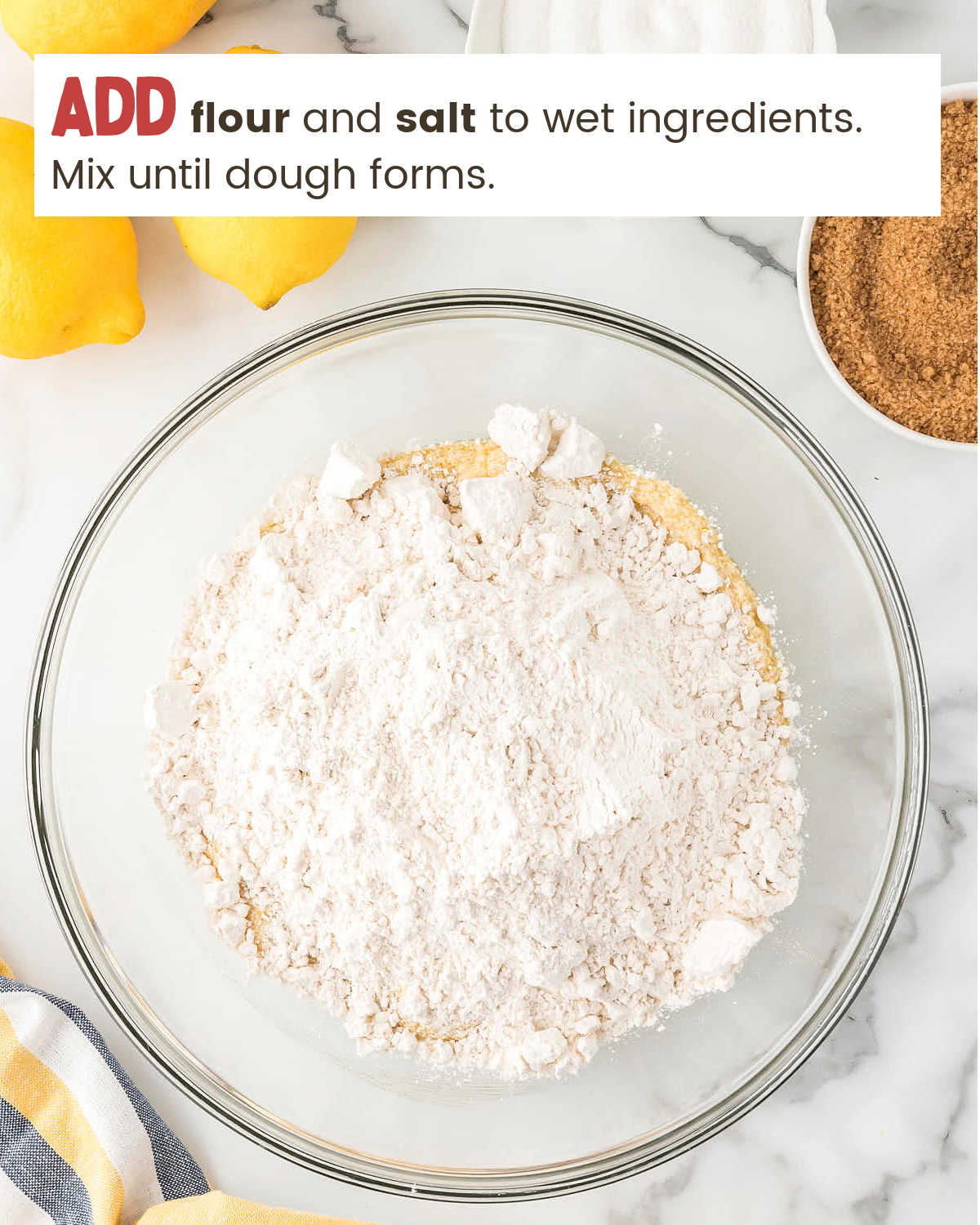 Dry and wet ingredients in a bowl for Lemon Shortbread Cookies.