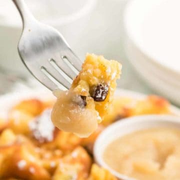 a forkful of freshly made Kaiserschmarnn with apple sauce