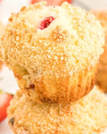 a closeup of a stack of strawberry muffins