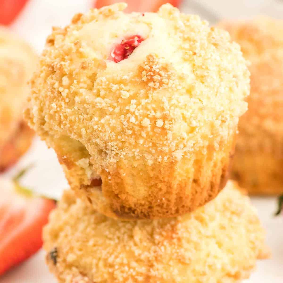 A closeup of a stack of strawberry muffins.