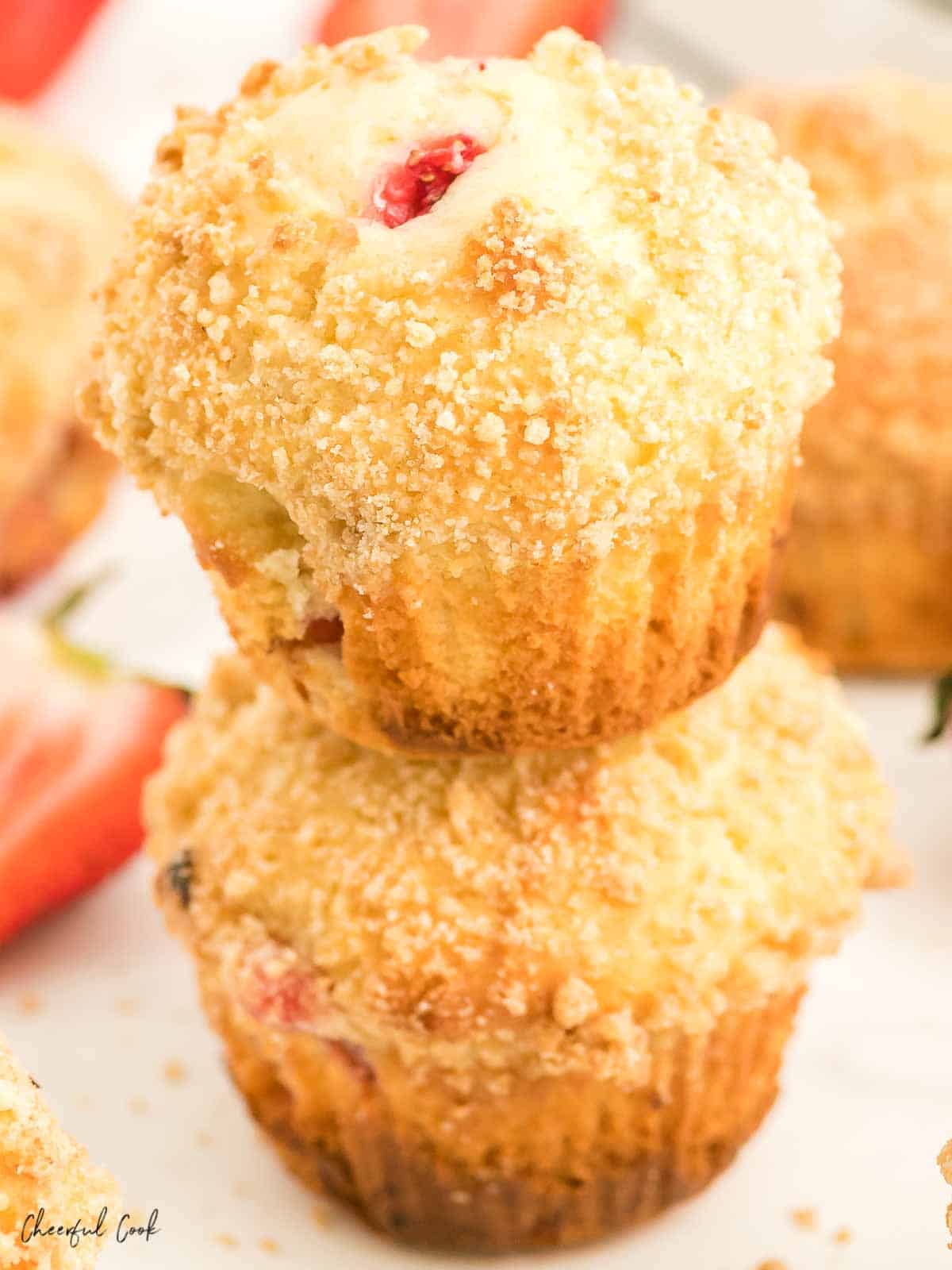 a stack of freshly baked Strawberry Streusel Muffins