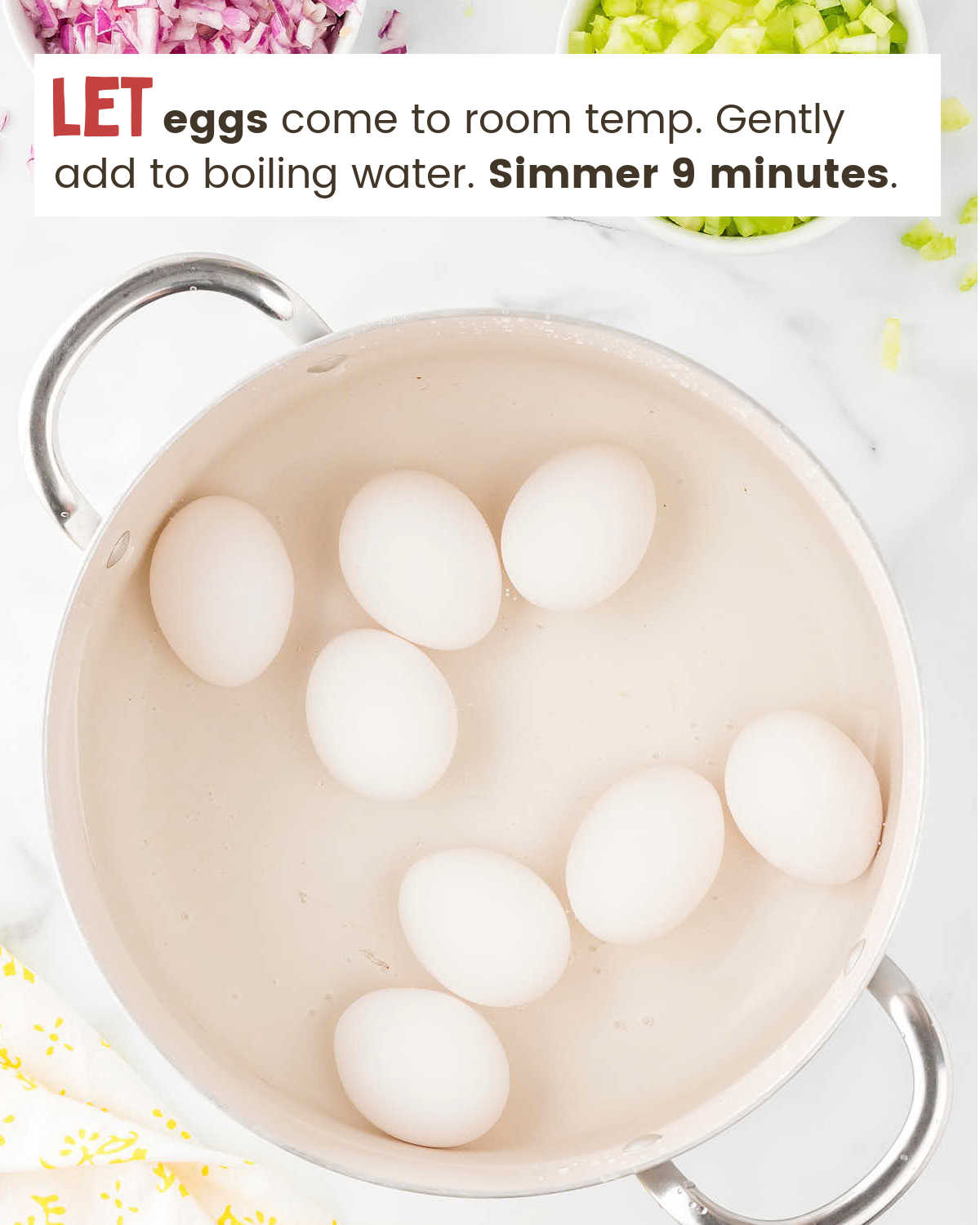 Boiling eggs in a pot for Egg Salad.