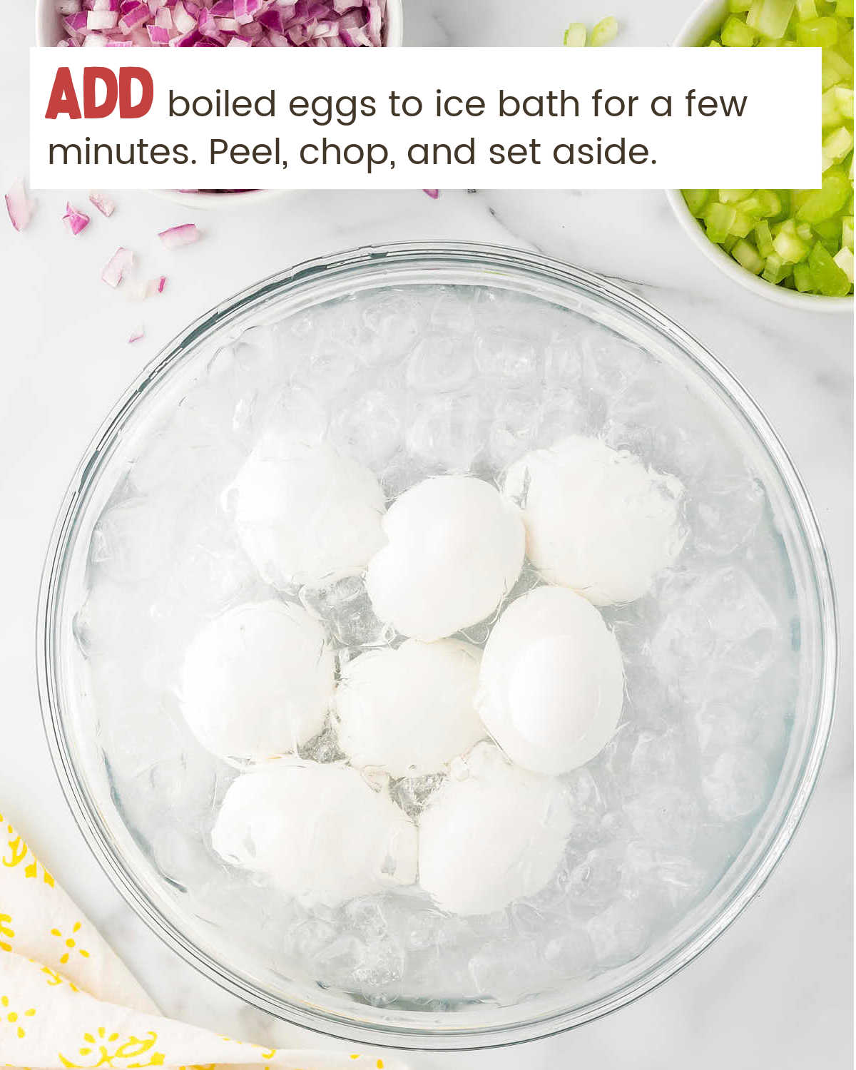 Adding boiled eggs to an ice bath for Egg Salad.