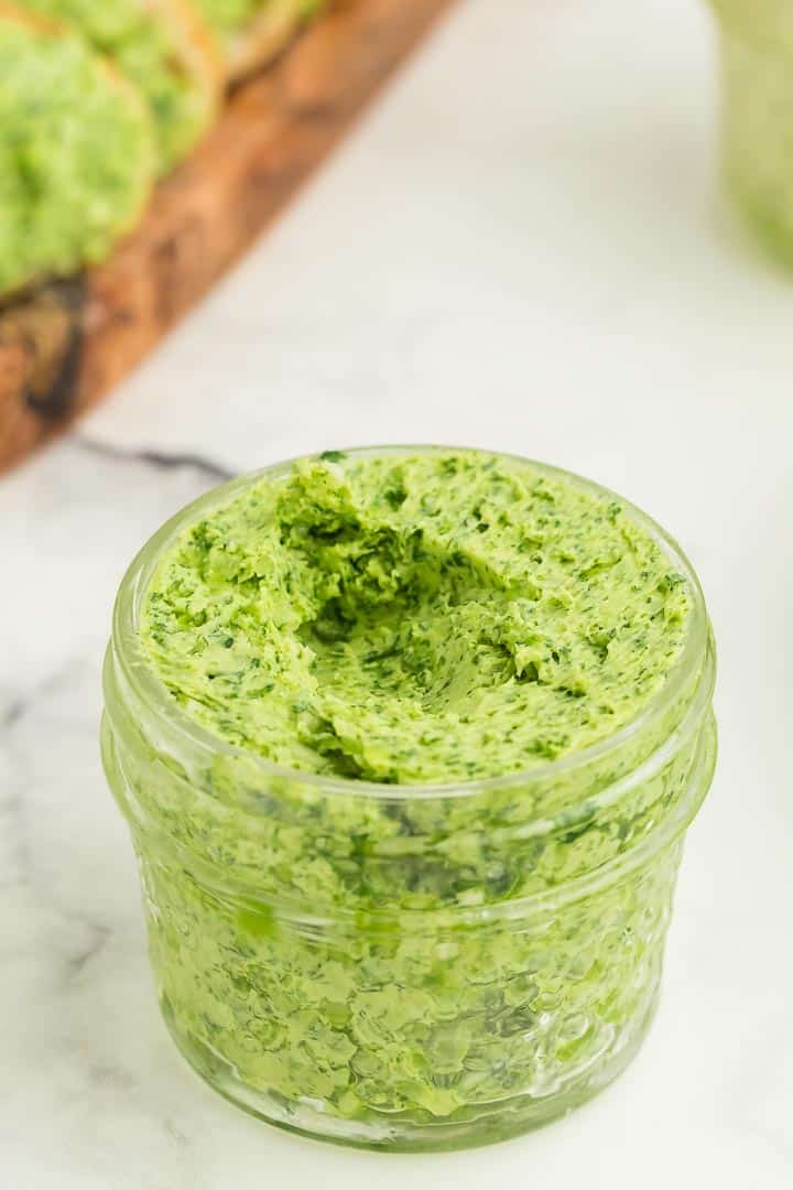 a small mason jar filled with freshly made parsley butter
