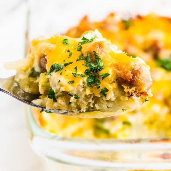 A closeup of a scoop of Sausage Hash Brown Casserole.