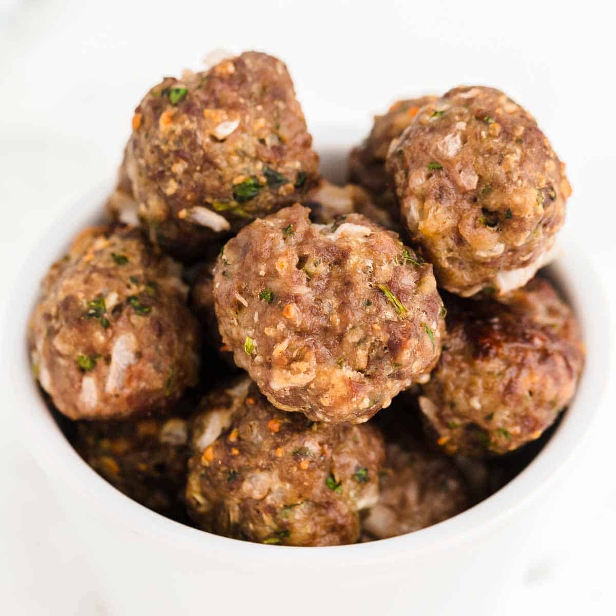 Baked Meatballs in a white bowl