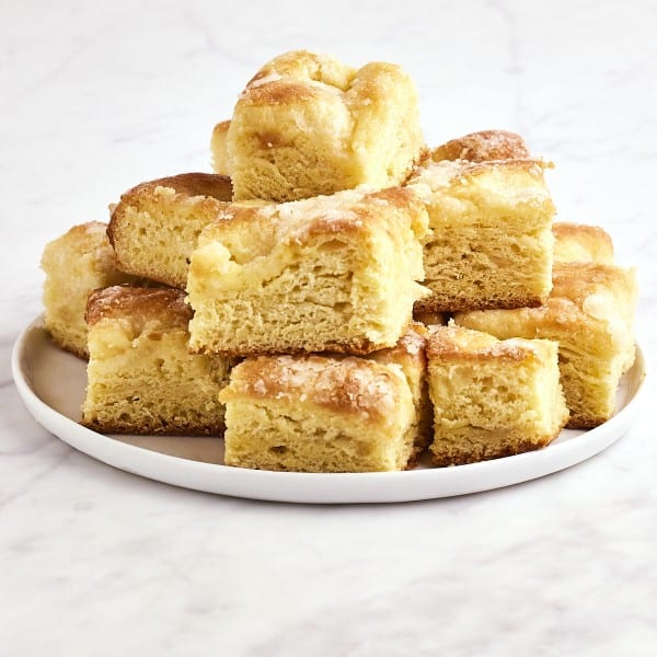 A plate of freshly baked Butterkuchen slices.