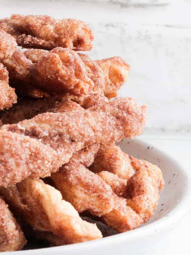 a plate of freshly baked cinnamon twists