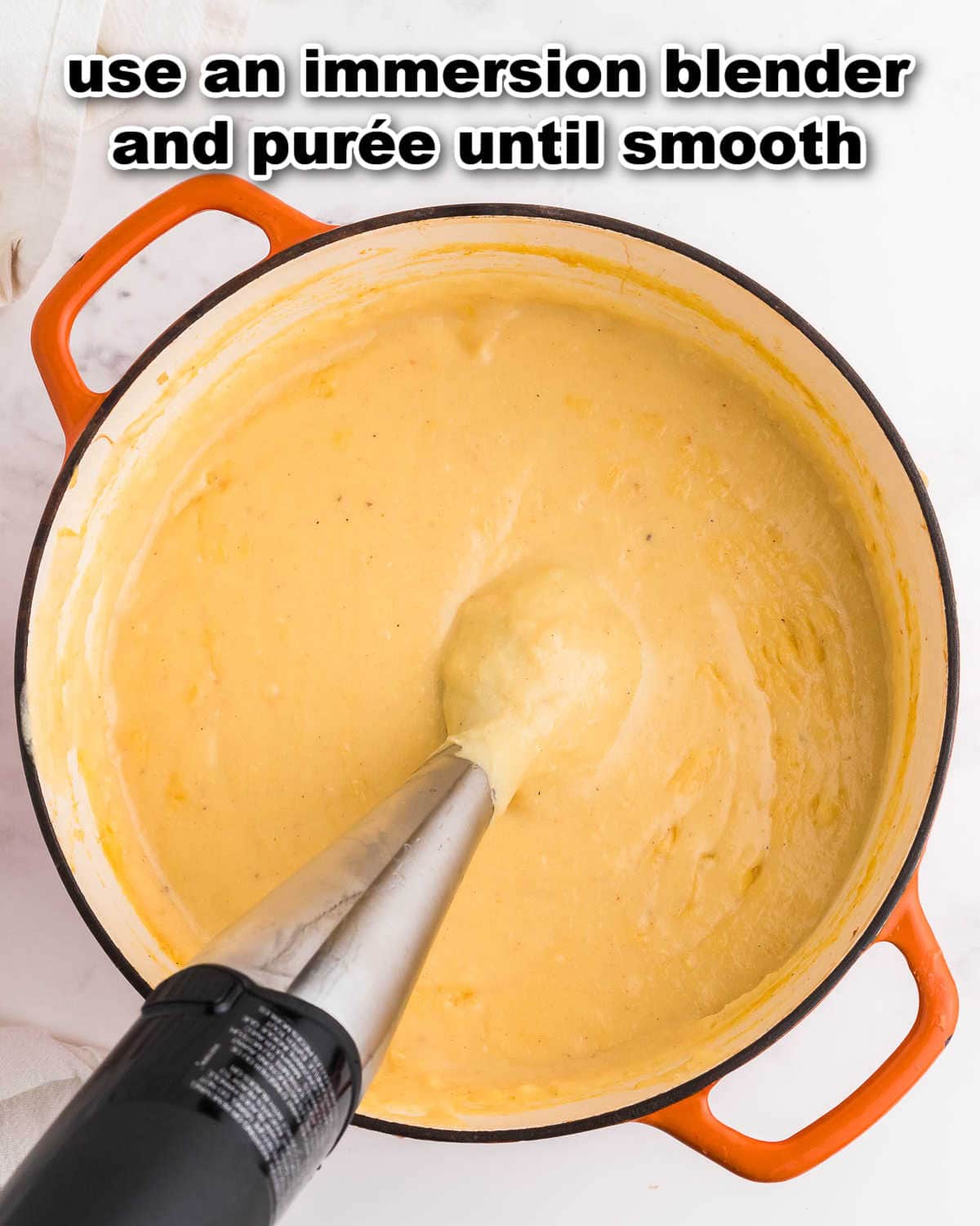 Step: Blend soup with an immersion blender.