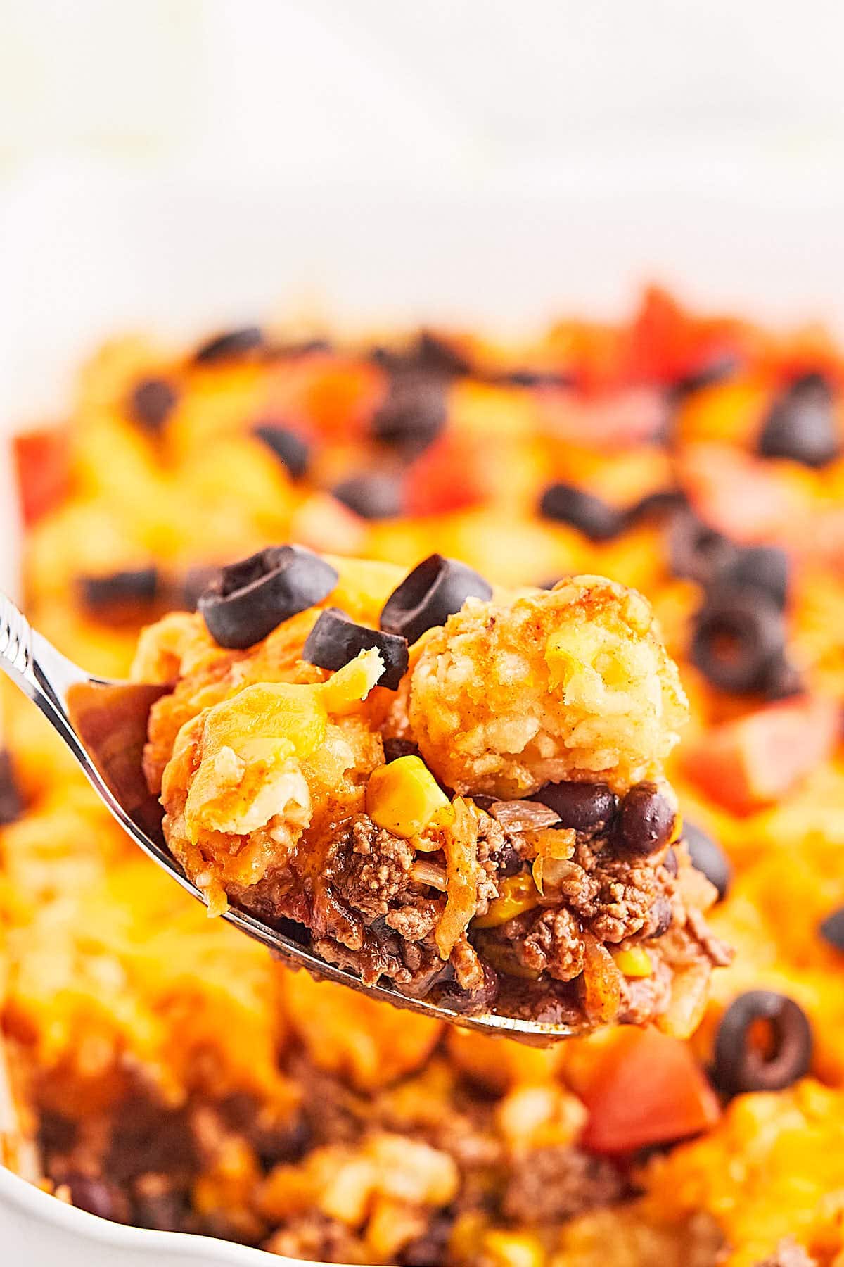 A spoonful of Tater Tot Casserole. 