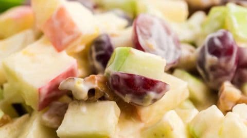 a closeup of a freshly made Waldorf Salad with Candied Walnuts