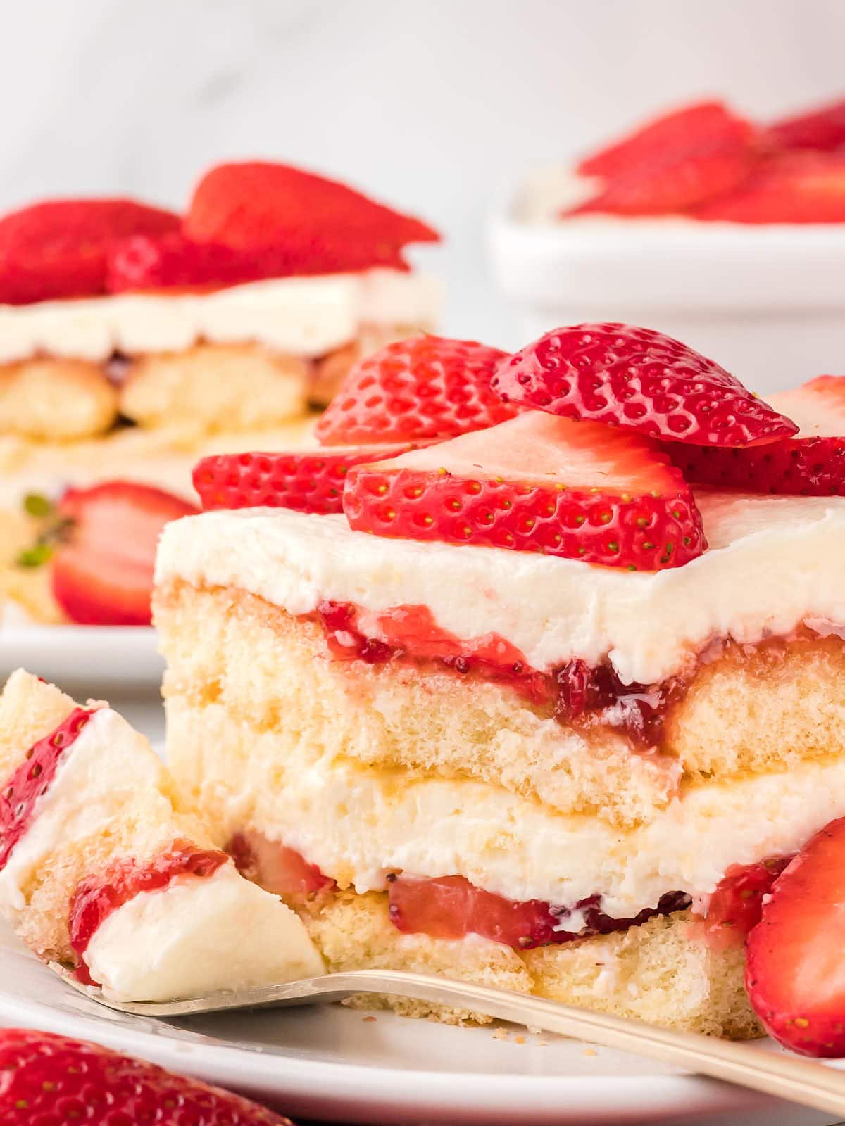 A closeup of a slice of Strawberry Tiramisu.