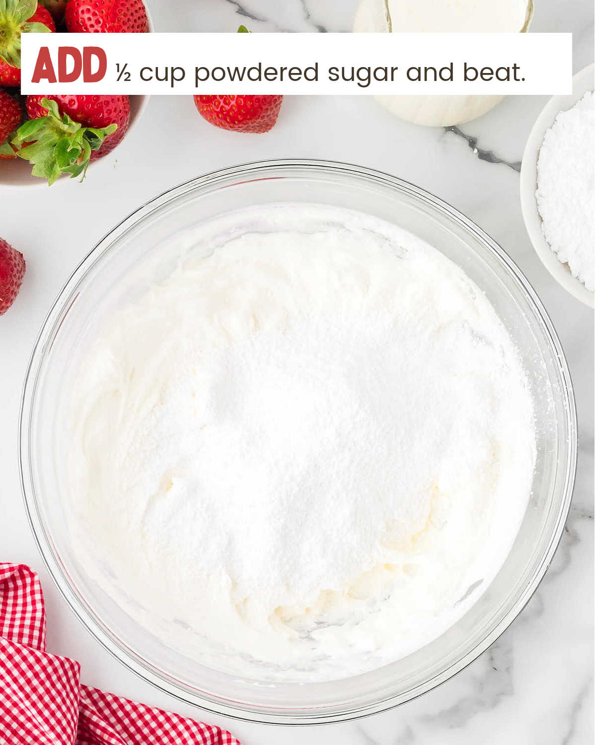 Adding sugar to cream for Strawberry Pie.
