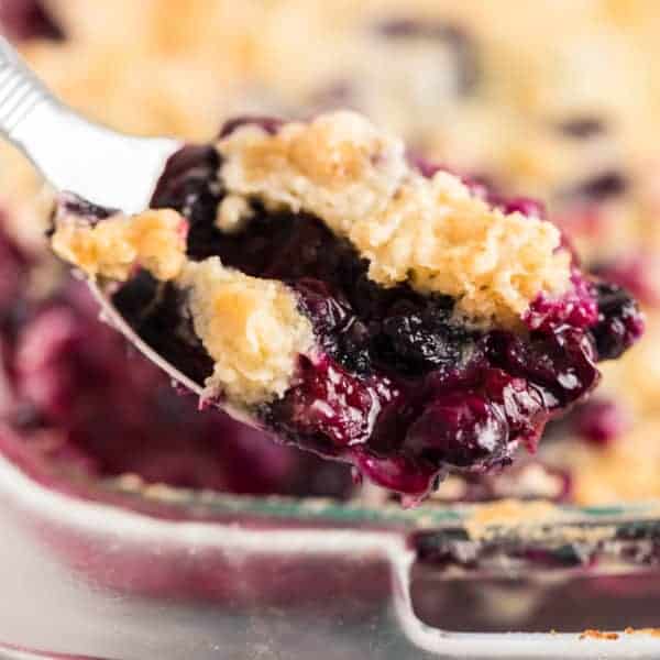 A scoop of freshly baked Blueberry Dump Cake.