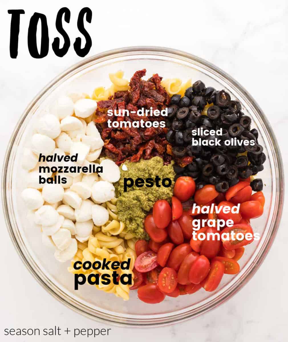 Step: toss pasta, pesto, halved tomatoes, halved tomatoes, sun-dried tomatoes, and sliced olives until well combined