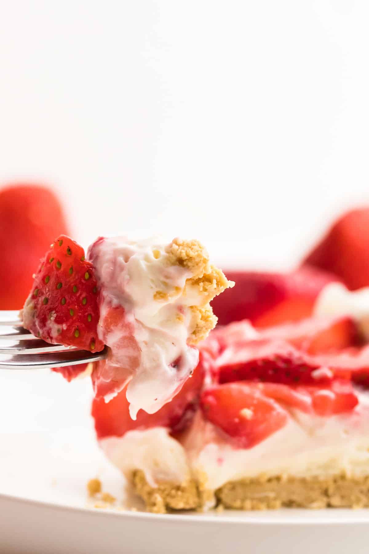 a forkful of freshly made creamy Strawberry Pie