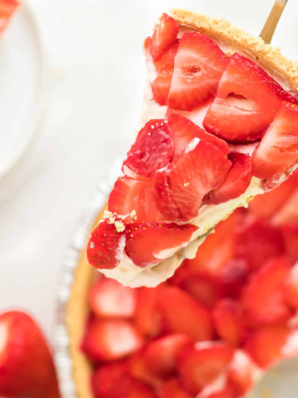 a slice of cream Strawberry Pie