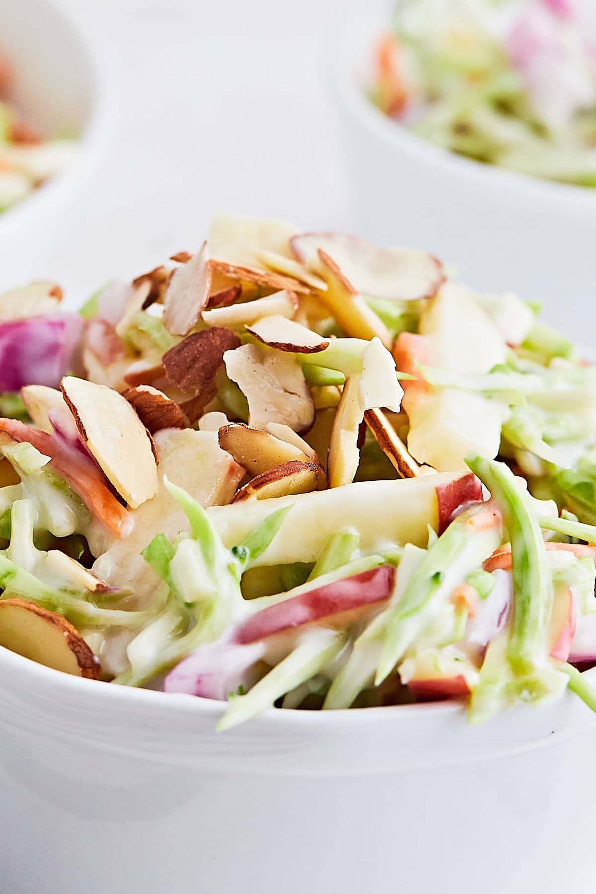 Creamy Broccoli Slaw with Apples and Almonds - Cheerful Cook