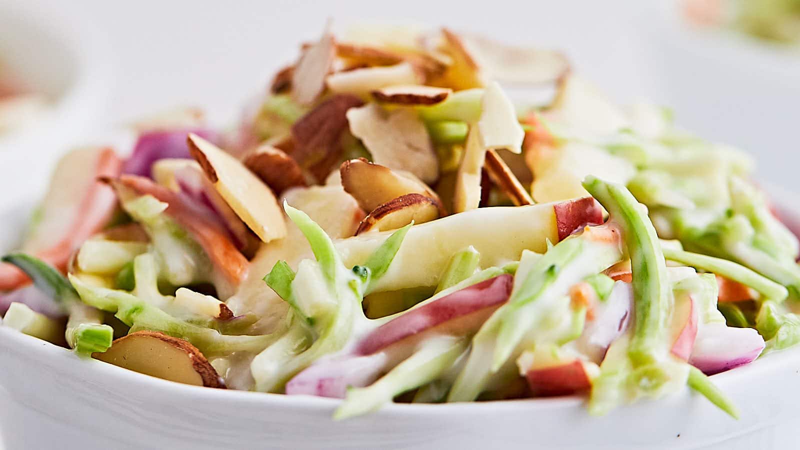 Creamy Broccoli Slaw with Apples and Almonds - Cheerful Cook