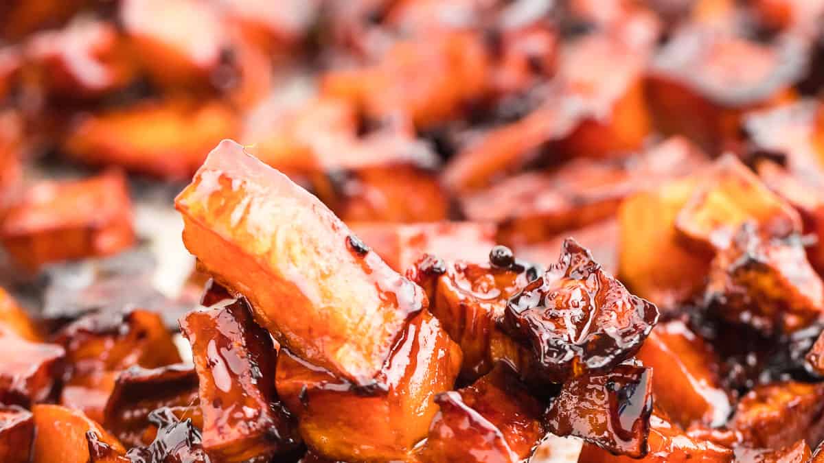 closeup of freshly candied sweet potatoes - fresh out of the oven