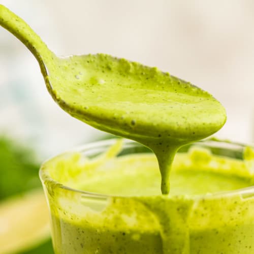 a spoonful of freshly made creamy cilantro lime dressing