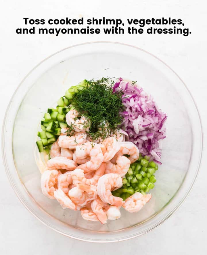 combine shrimp, chopped vegetables and dressing