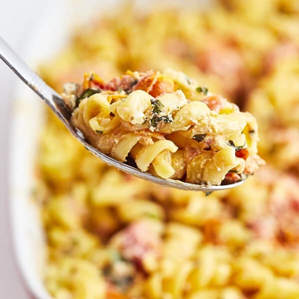 A spoonful of the Baked Feta Pasta straight from the casserole dish.