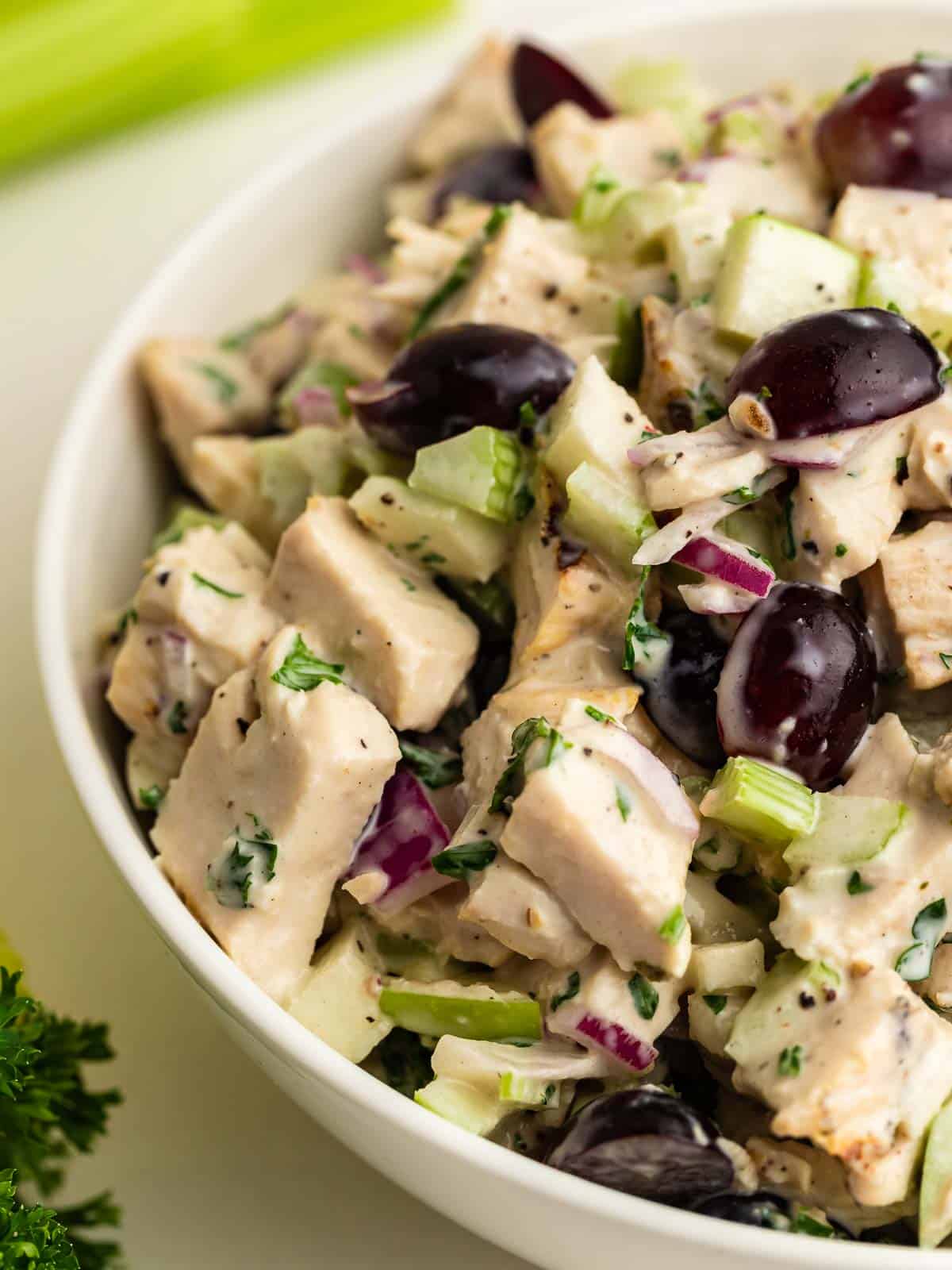 the best creamy chicken salad with grapes served in a white bowl