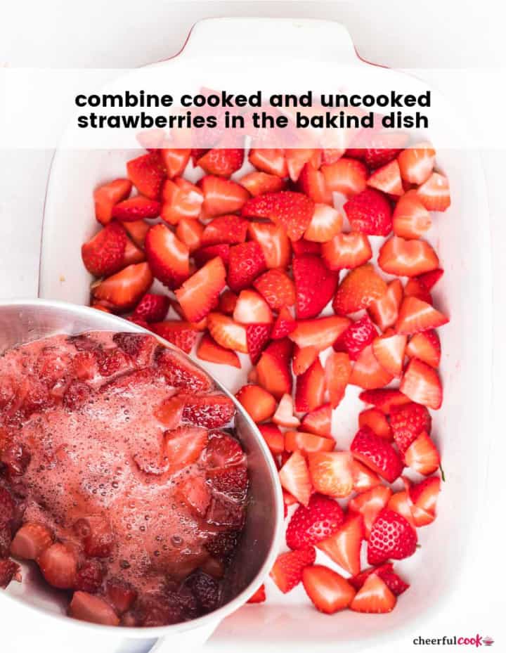 process step: adding the cooked strawberries to the uncooked strawberries in the baking dish