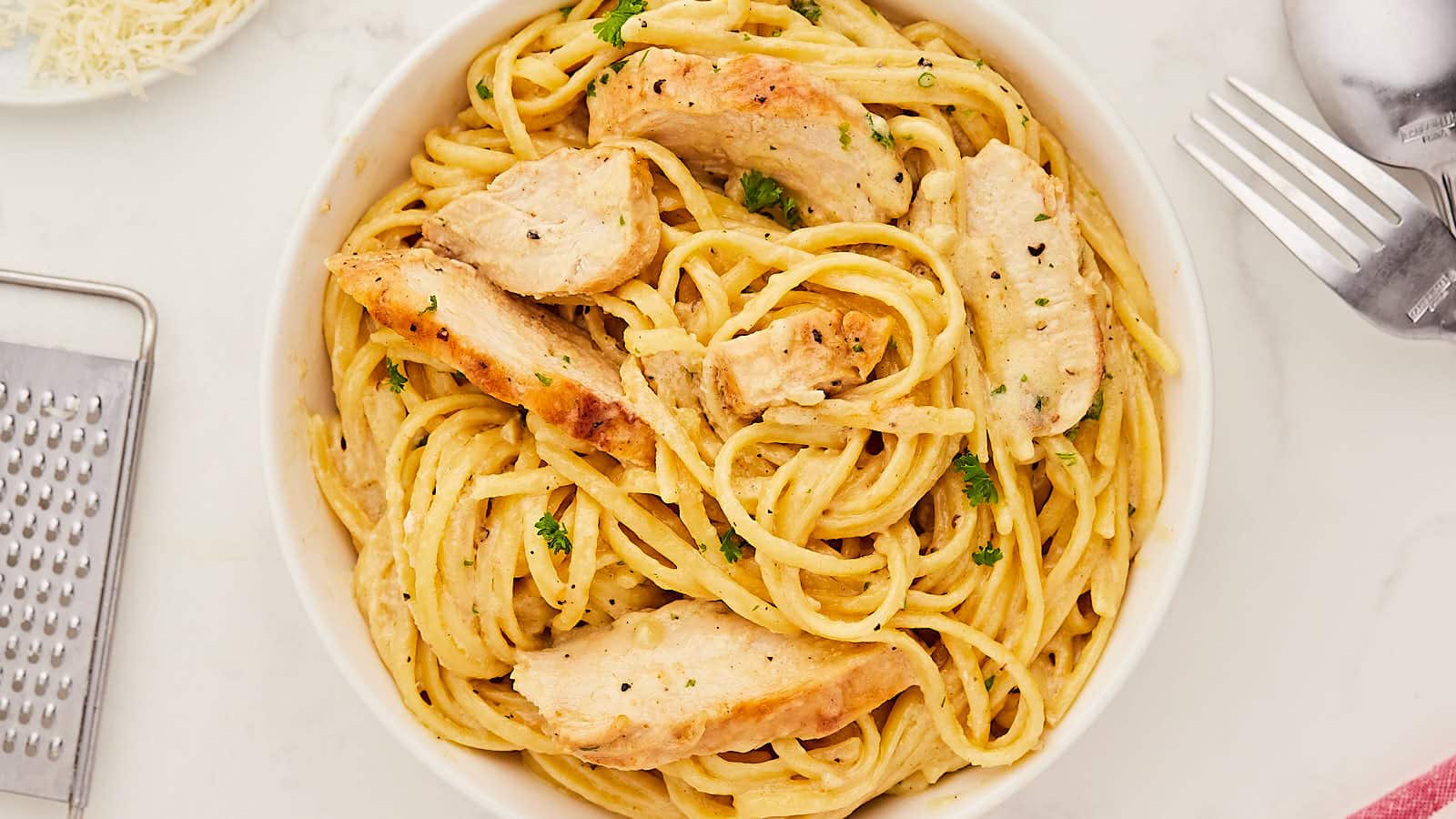 Make your favorite restaurant food at home and find out how easy it is to make classic Chicken Alfredo at home. This homemade, creamy Fettuccine Chicken Alfredo recipe takes just about 30 minutes to make. Easy Chicken Dinner Recipe #cheerfulcook #chickenalfredo #fettuccine #dinner #recipe #easy