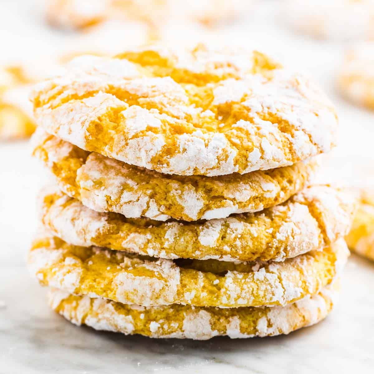 A stack of freshly baked Lemon Crinkle Cookies.