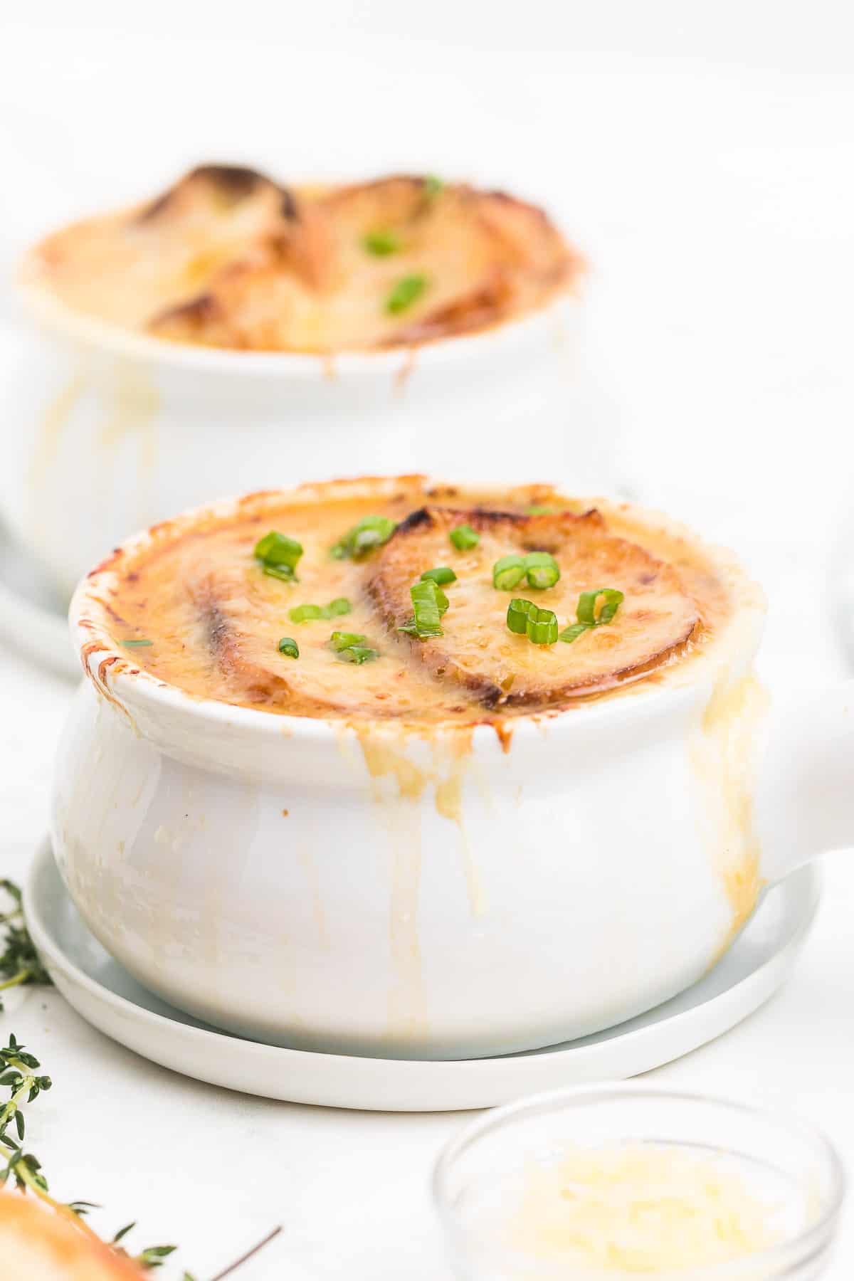 two french onion soups fresh out of the oven