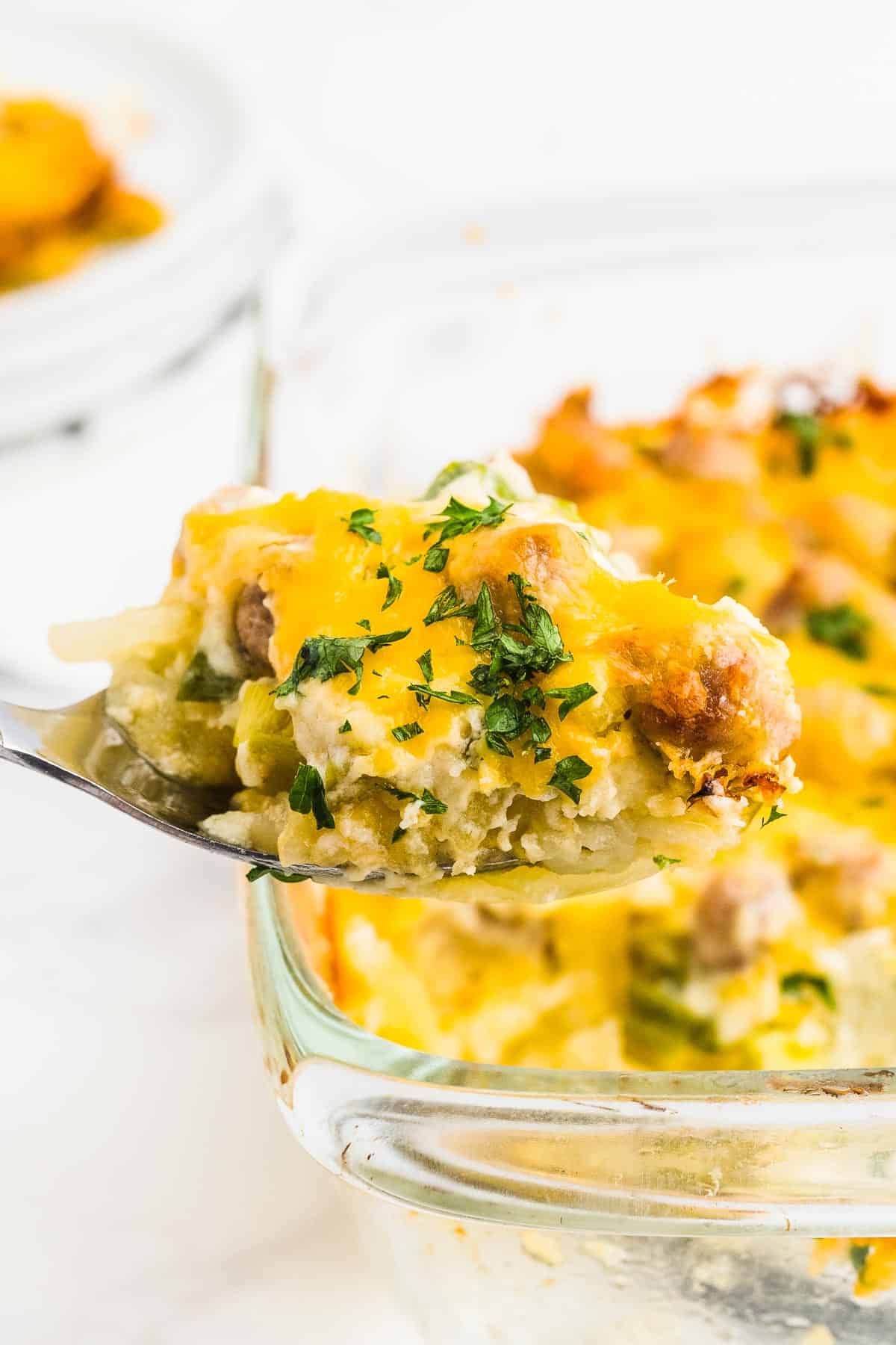 A scoop of Sausage Hash Brown Casserole.