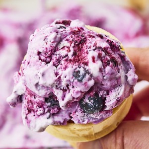 Homemade Blueberry Ice Cream in a cone.
