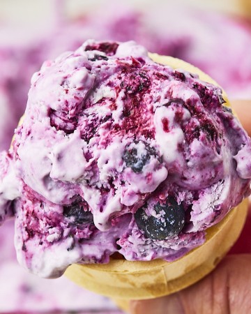 Homemade Blueberry Ice Cream in a cone.