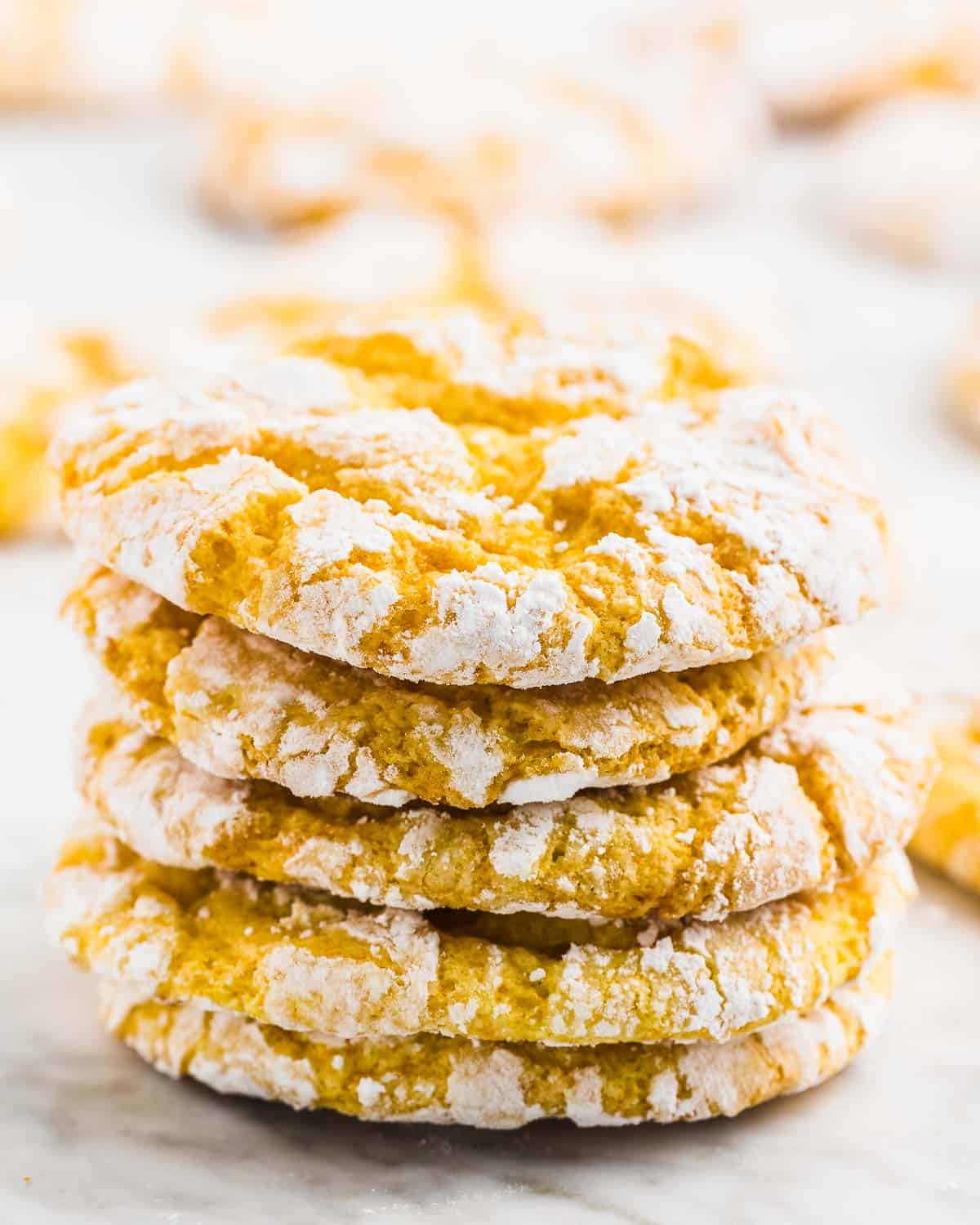 A stack of freshly baked Lemon Cool Whip cookies.