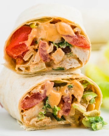 A Chipotle Chicken Wrap cut in half and stacked.