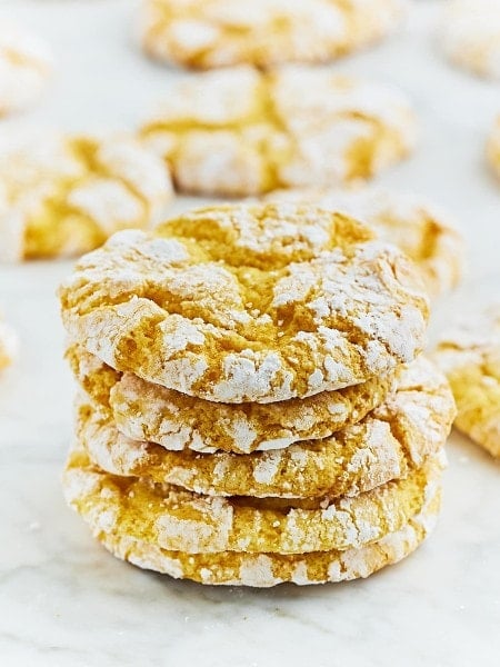 A stack of freshly baked Lemon Crinkle Cookies.