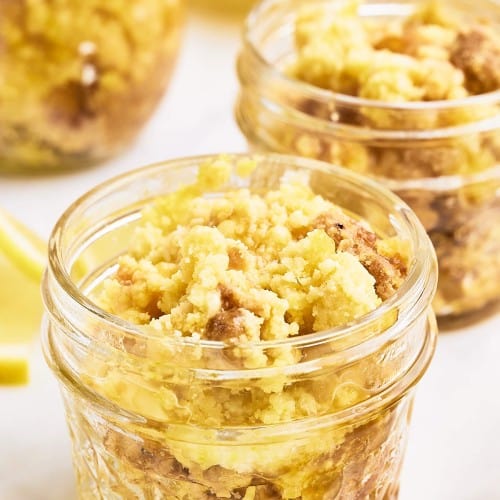 Lemon Dump Cake served in a mason jar.