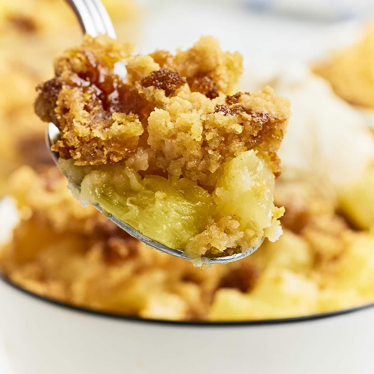A forkful of warm Pineapple Dump Cake.